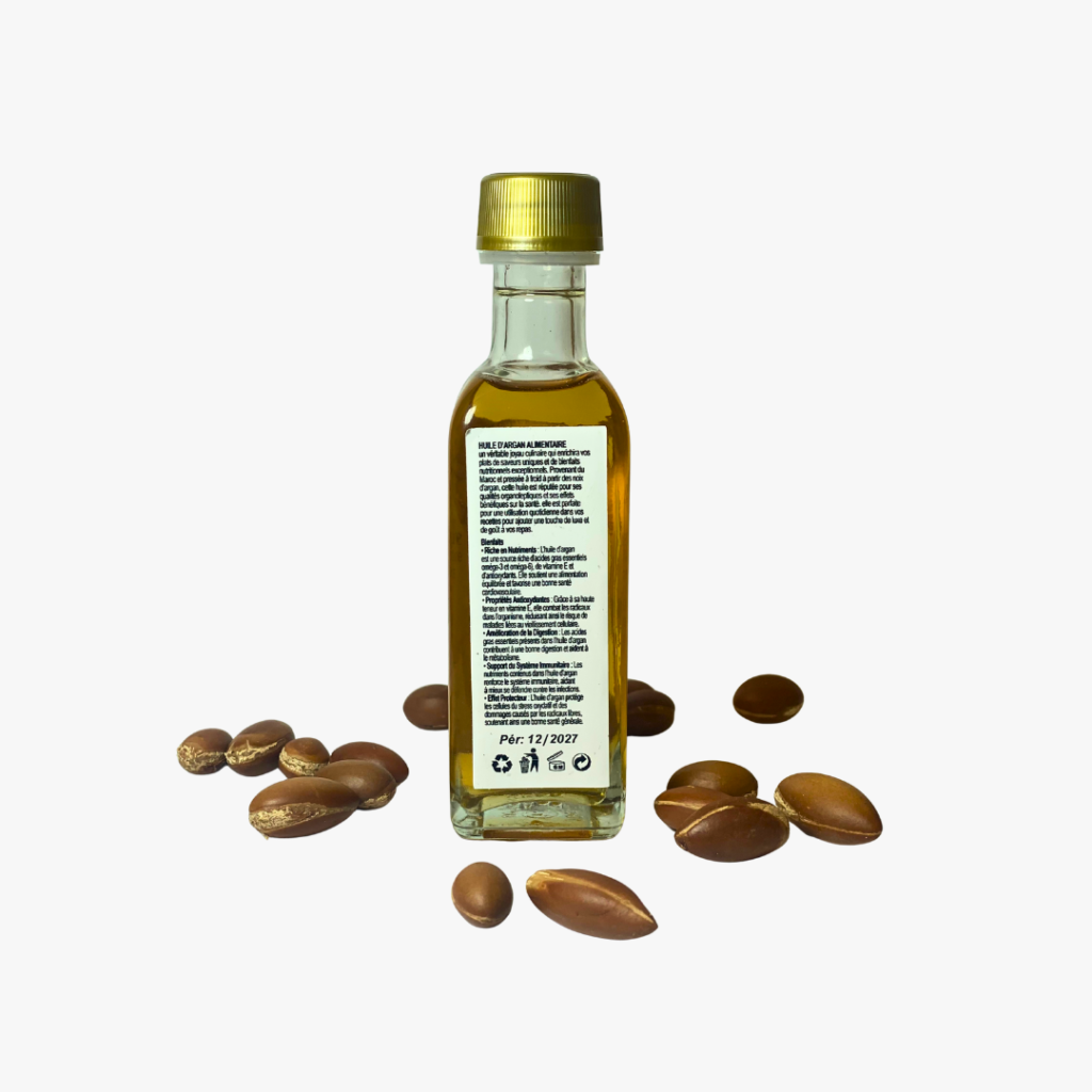 An Arganisme culinary argan oil bottle with kernels